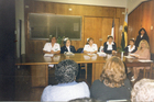 Firma de entrega de subvención de la municipalidad